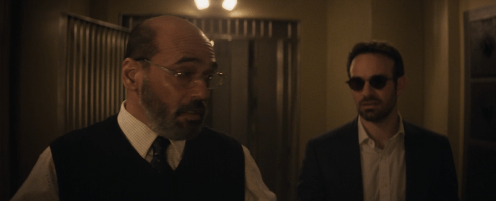 Yusuf Khan and Matt Murdock stand in front of a safe. From Daredevil: Born Again.